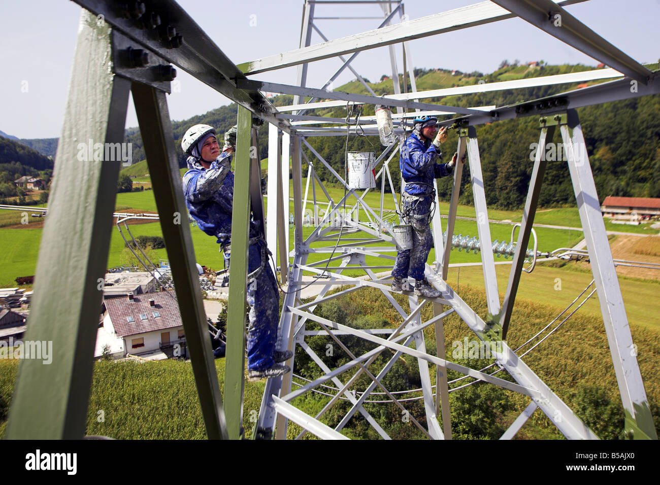 Workers maintaining the transmission line Stock Photo Alamy