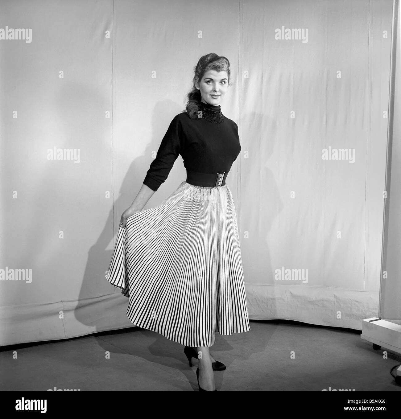 Wearing pleated skirt hires stock photography and images Alamy