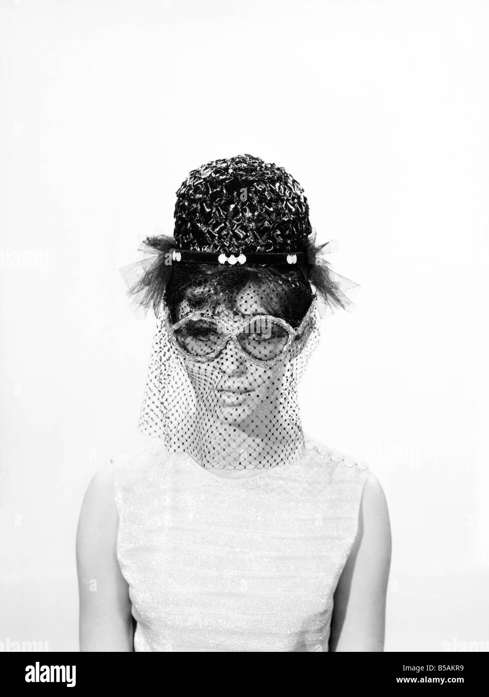 Clothing Fashion Hats Woman wearing hats with veils and glasses