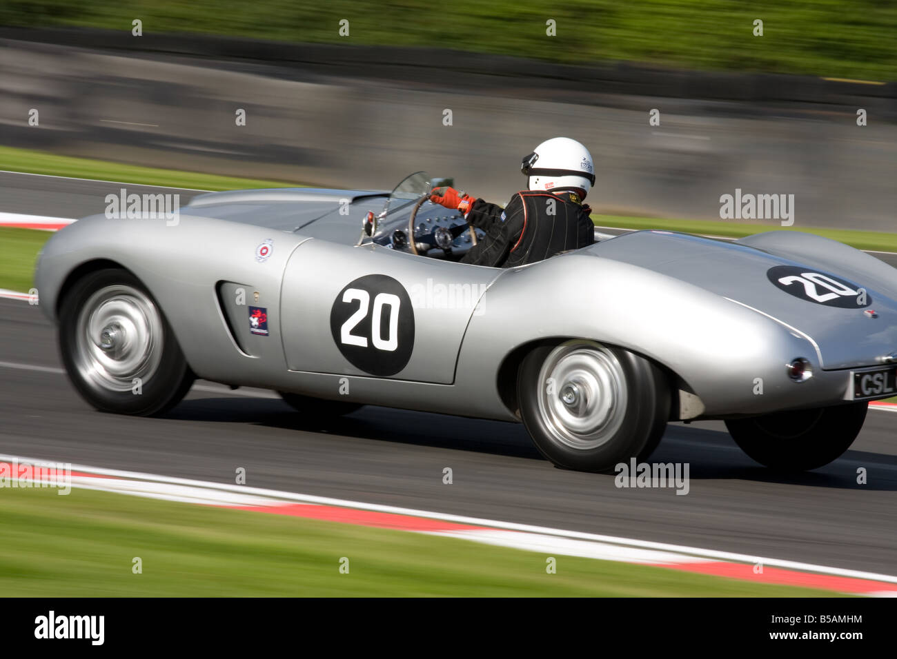 A classic race car at full chat going round the Brittens chicane at Oulton Park in Cheshire UK at the 2008 Gold Cup meet. Stock Photo