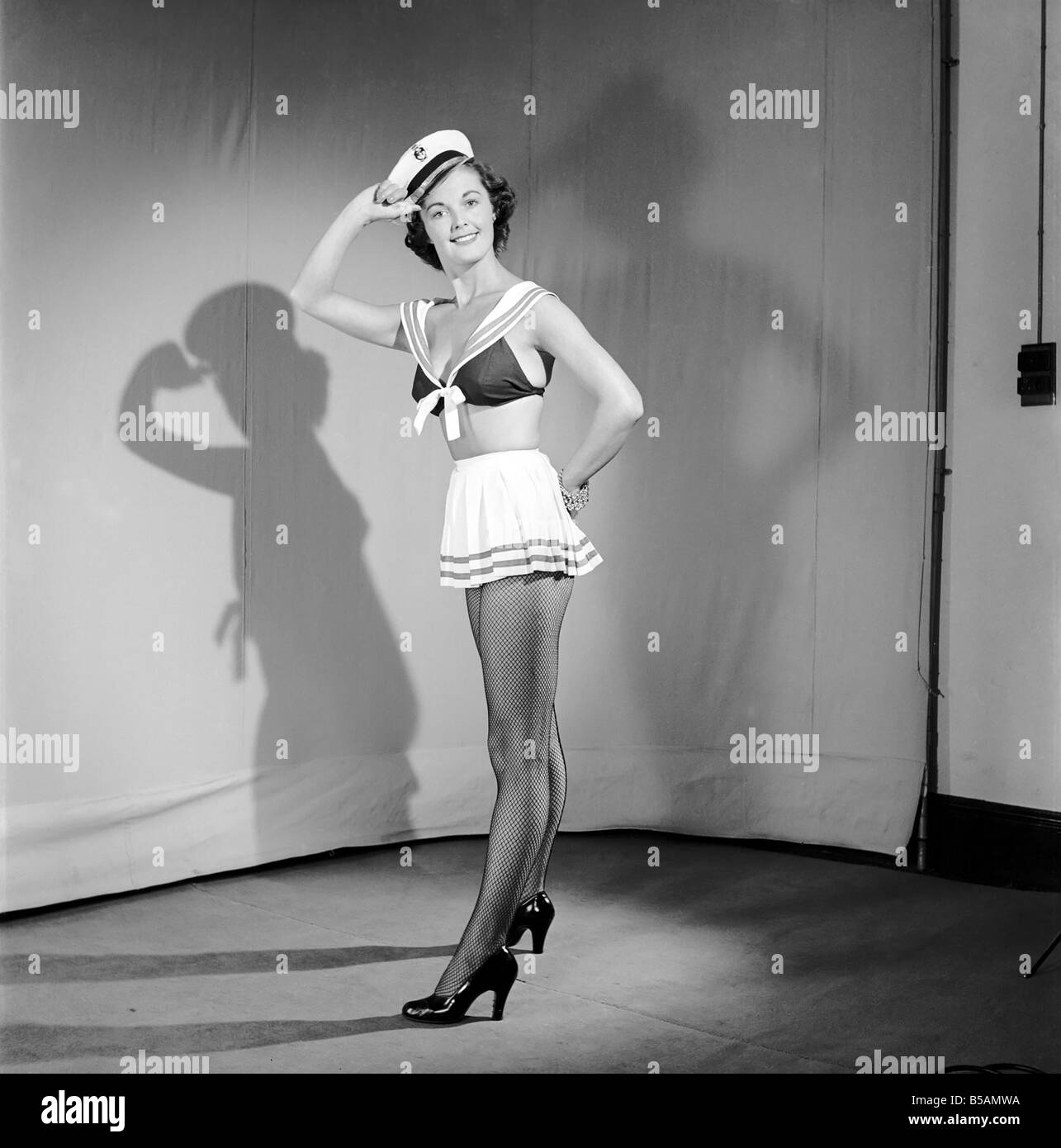 Model wearing fancy dress sailors outfit. 1959 E34-003 Stock Photo