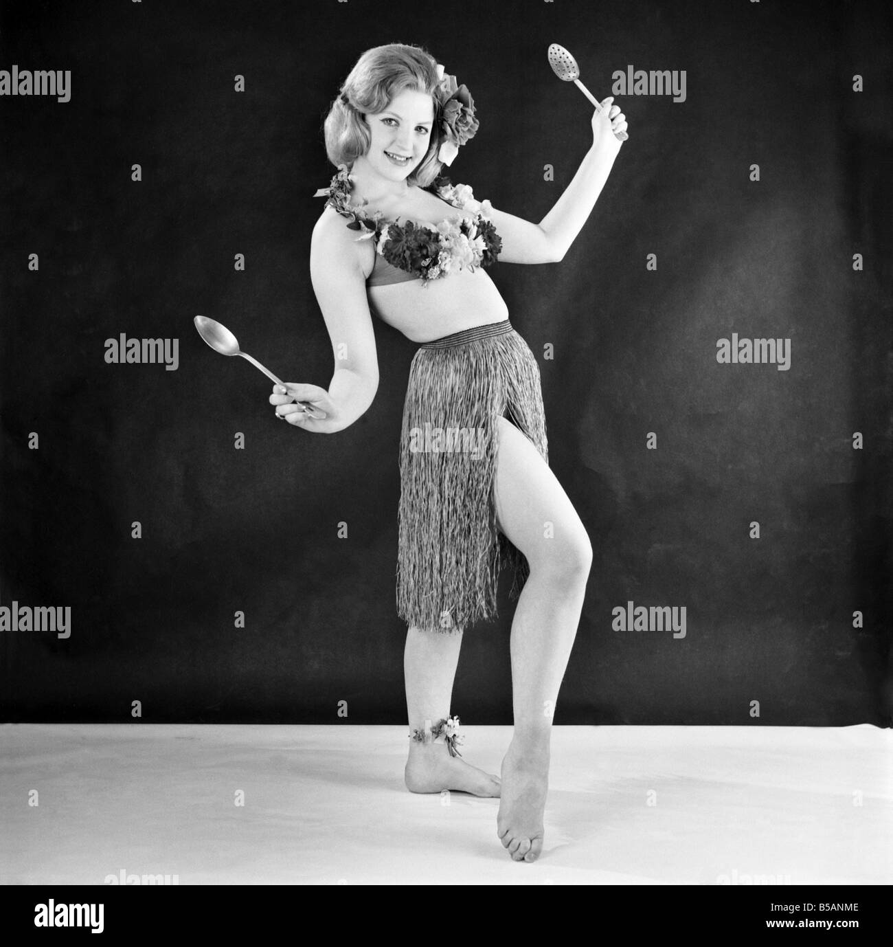 Hula girl costume modelled by Peggy Cage. E500012 Stock Photo Alamy