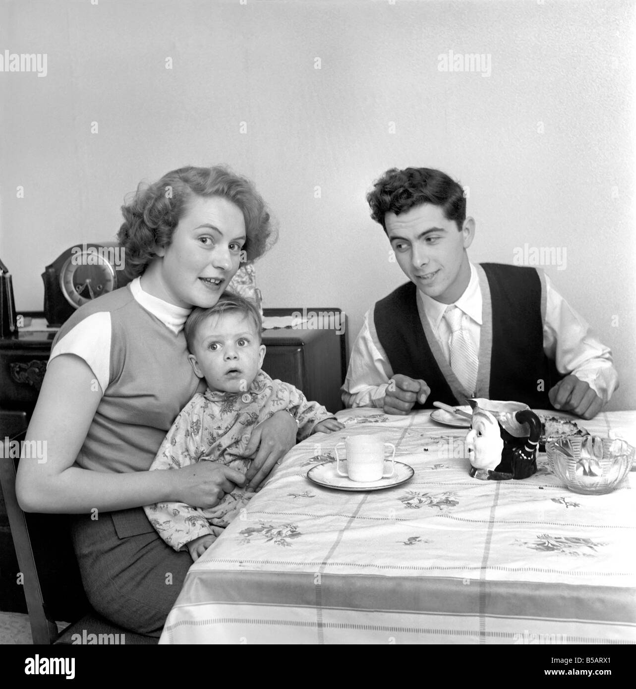 Family life: Mr. and Mrs. Hull with their son having tea. 1954 A160-006 Stock Photo