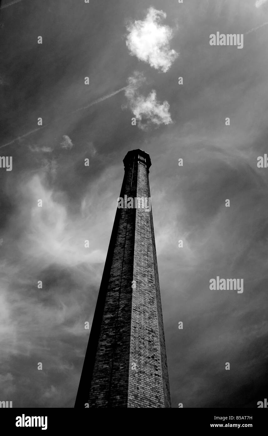 The chimney stack of Coldharbour Mill, a 200 year old spinning mill set in the tranquil village of Uffculme, Devon,PM2.5, Stock Photo