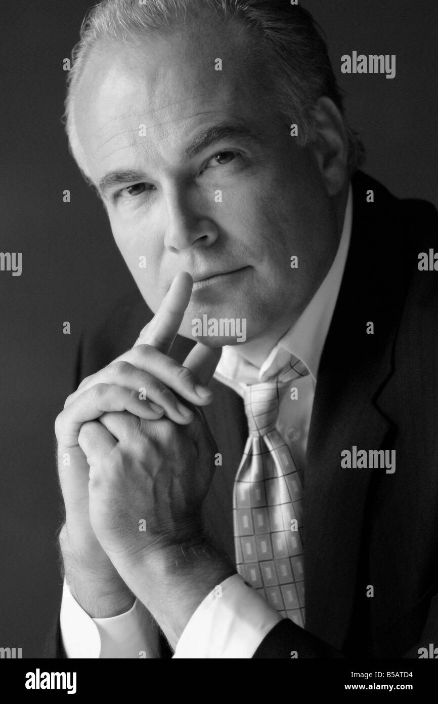 Businessman looking serious Black and White Stock Photos & Images - Alamy