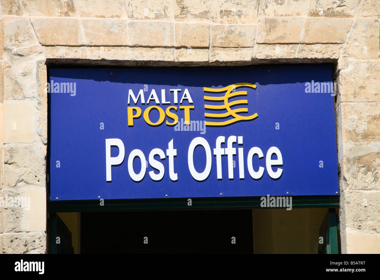 A sign over the "Post Office" door in Valletta, Malta Stock Photo Alamy