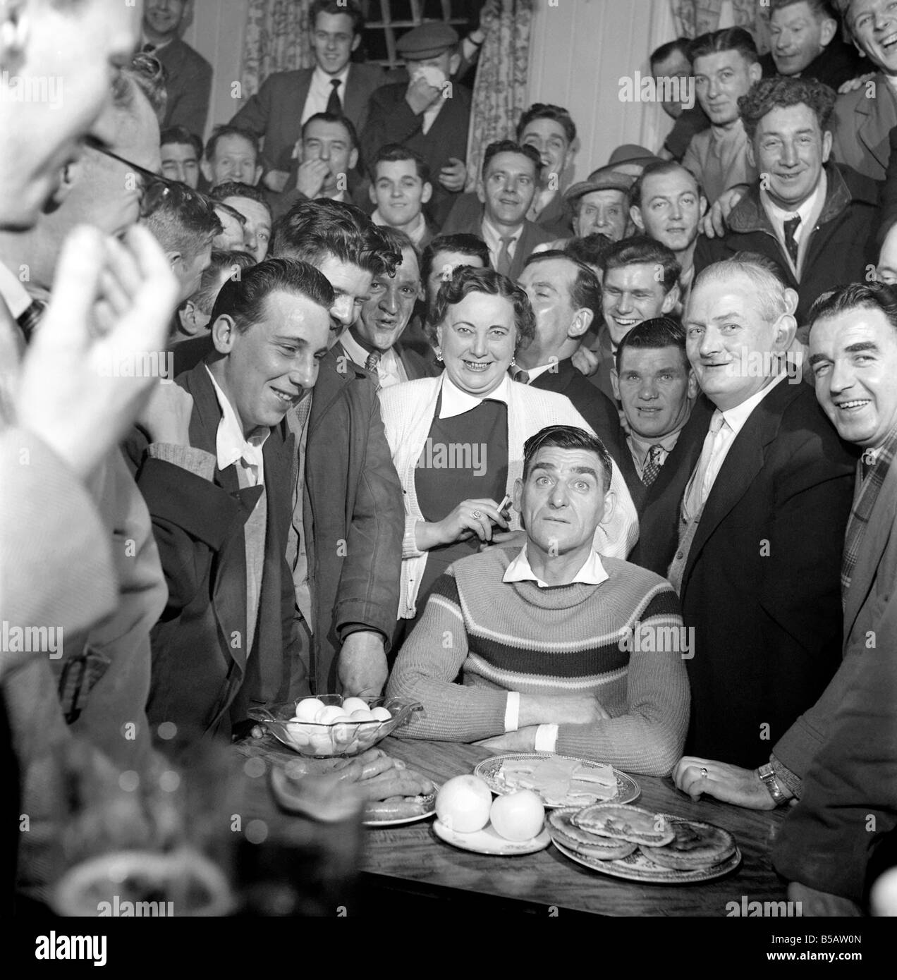 Miner Joe Steele seen here taking part in a food eating competition. January 1958 A630-003 Stock Photo