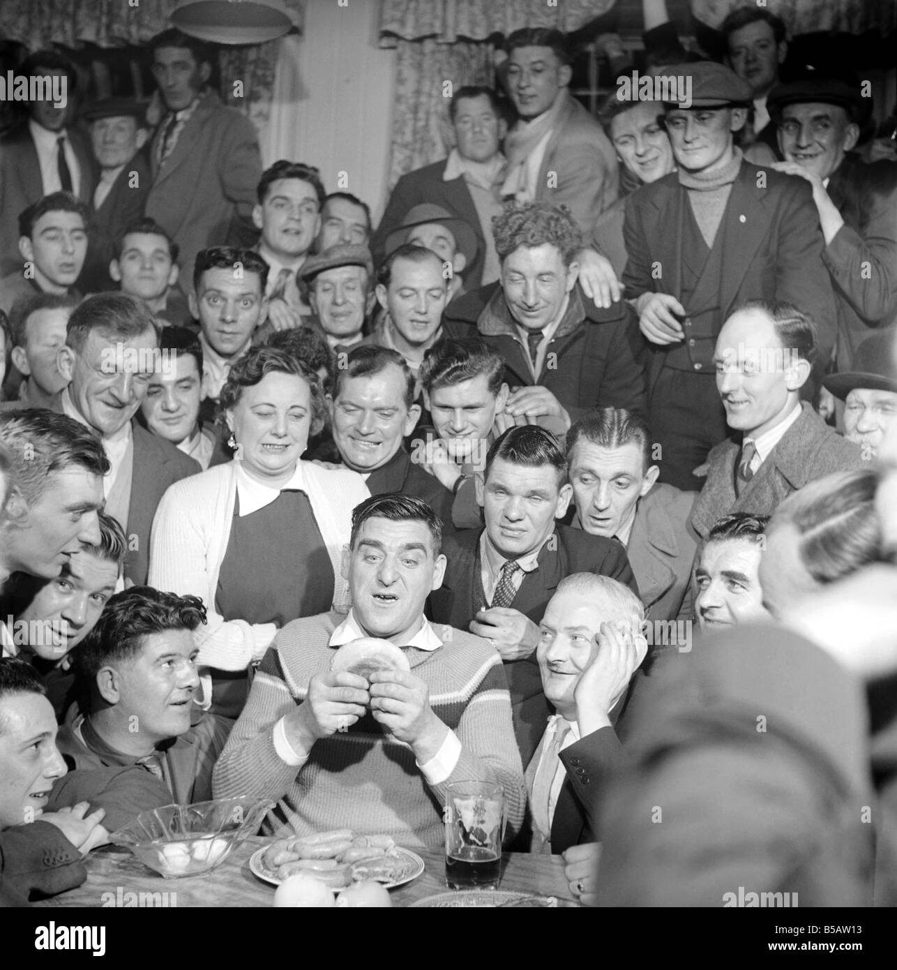 Miner Joe Steele seen here taking part in a food eating competition. January 1958 A630-007 Stock Photo