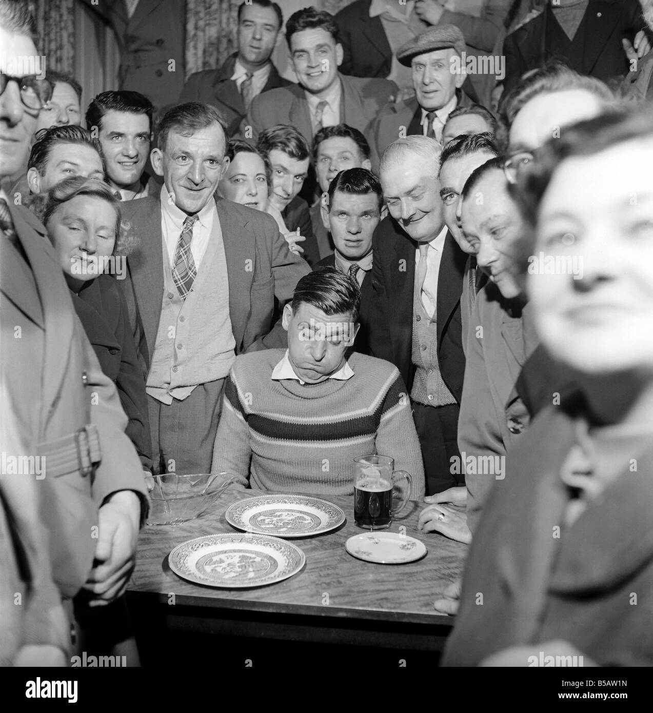 Miner Joe Steele seen here taking part in a food eating competition. January 1958 A630-013 Stock Photo