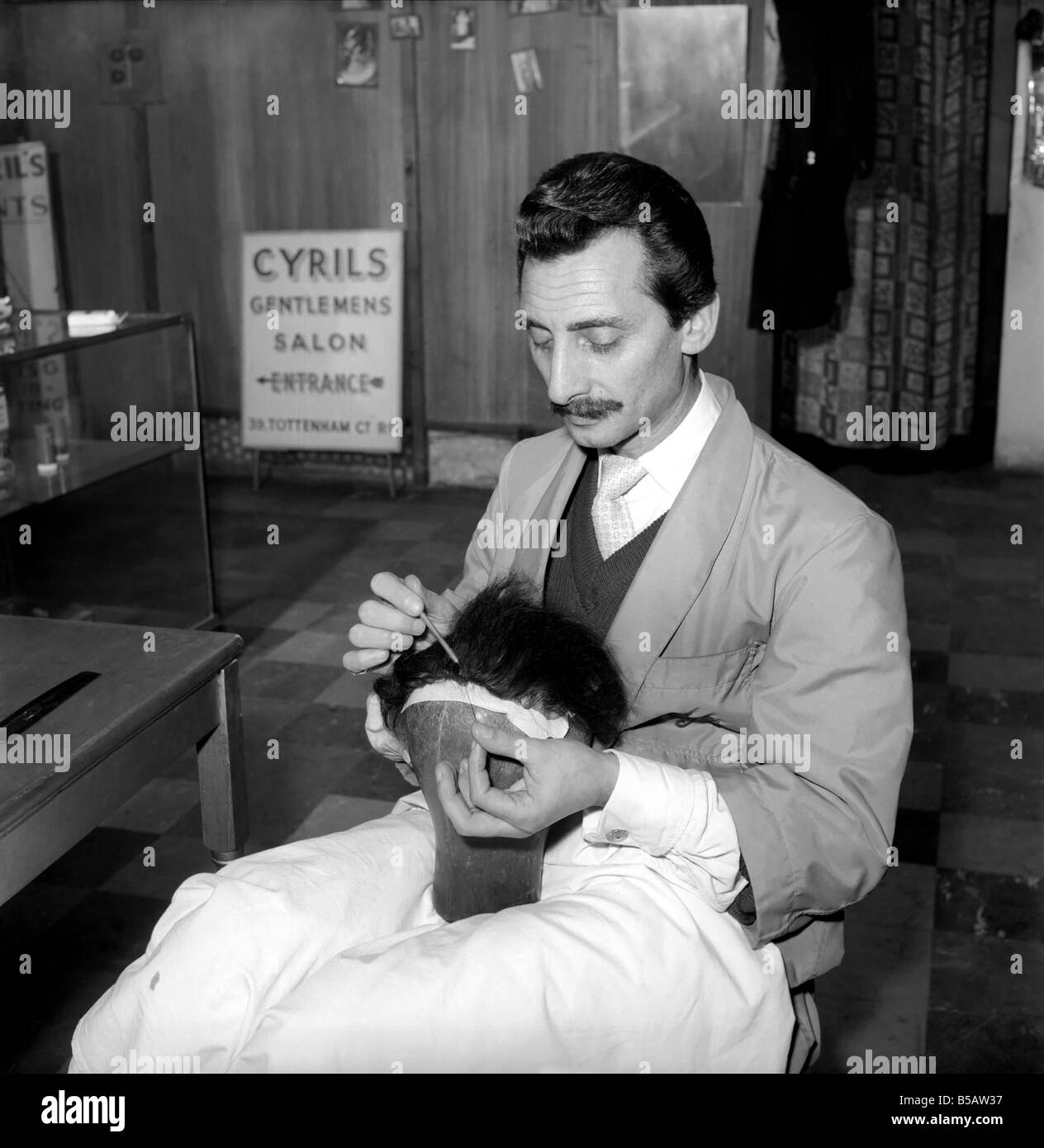 Wig Maker: Josephine Anne's hair is made into a wig for Peter Kent. Our  picture show how this was completed at Cyrils Gentlemens Hair Salon.  February 1958 A635-009 Stock Photo - Alamy