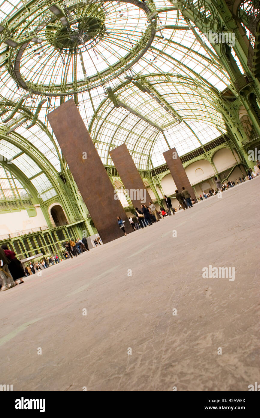 The steel slabs of Richard Serra's 'Monumenta' sculpture called 'Promenade' rise from the floor at the Grand Palais in Paris. Stock Photo