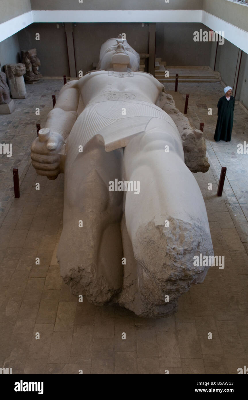 The giant carved limestone statue of Rameses II in the open-air museum in Memphis the ancient capital of Aneb-Hetch, the first nome of Lower Egypt Stock Photo