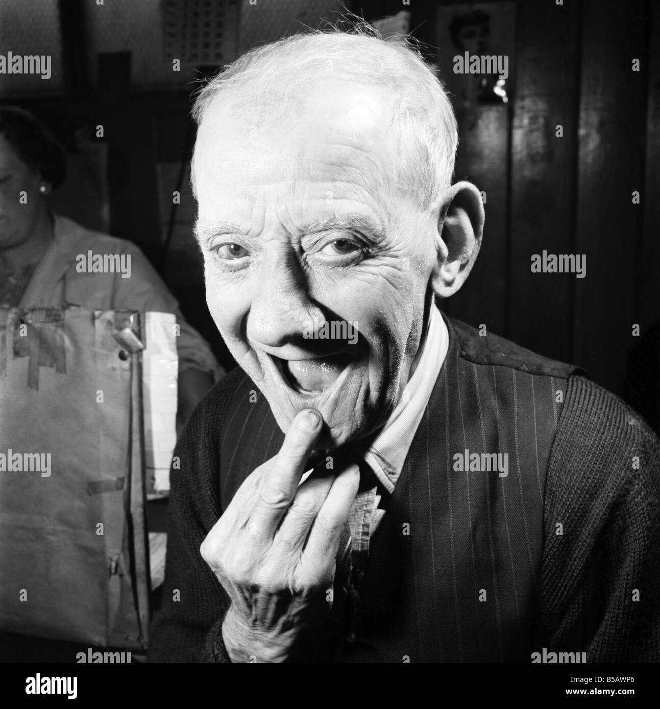 Pensioner with a new tooth. 77 year old man (George Berry) shows off his new tooth. July 1958 A702 Stock Photo