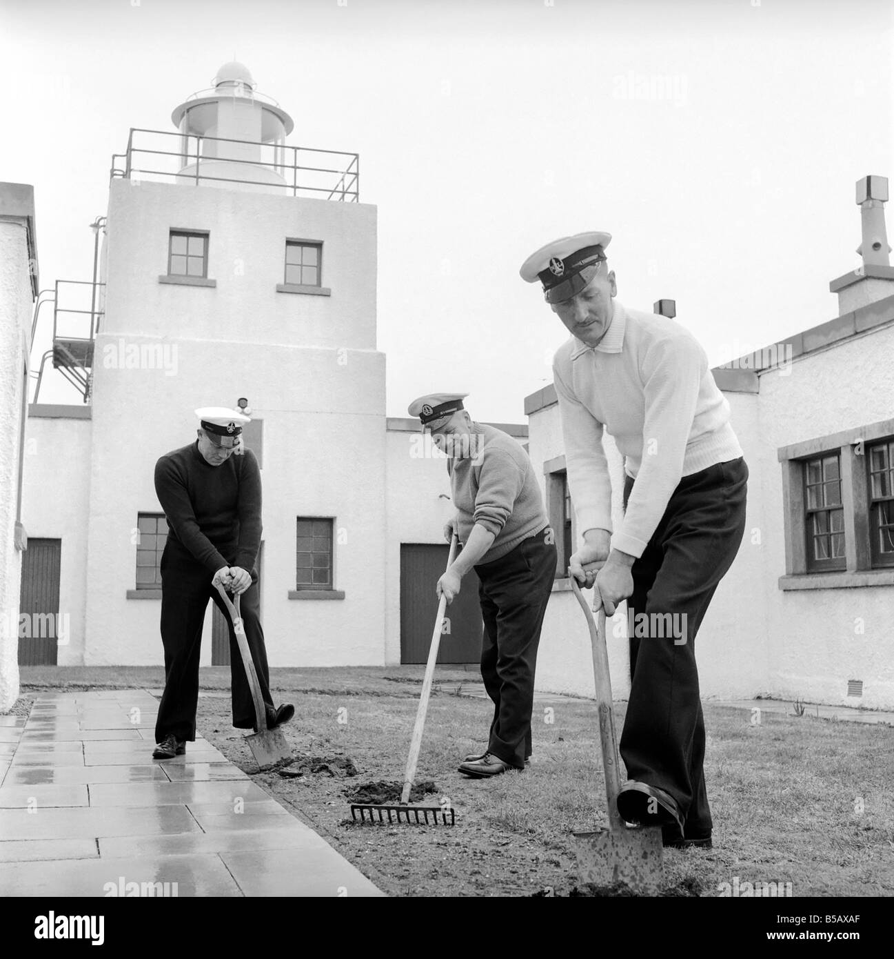 The lighthouse keepers and their families go about their daily duties