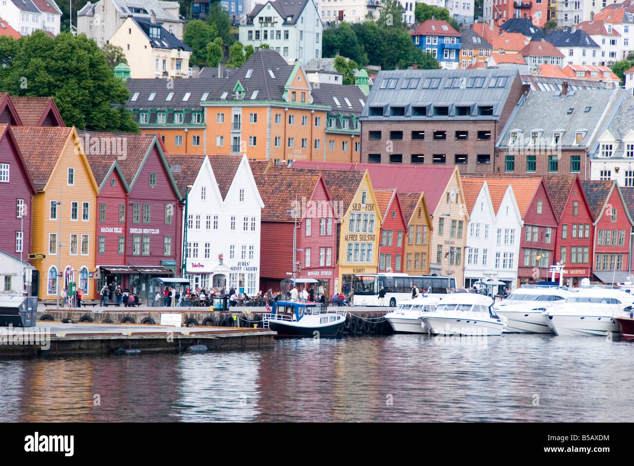 The mishapen and colorful storefronts line the Bryggen dock, a UNESCO World Heritage site, in Bergen Norway Stock Photo