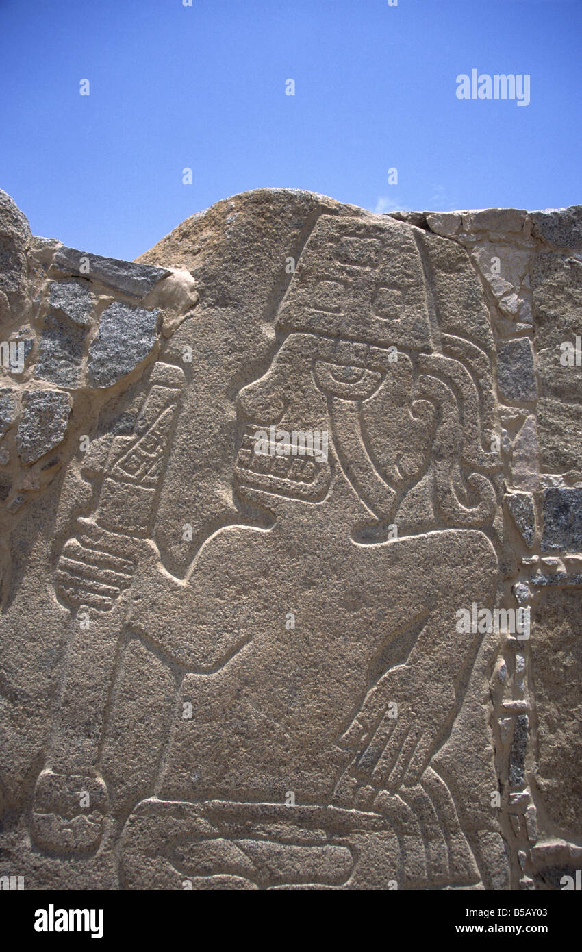 Carved stone warrior relief in pre-Chavin site of Cerro Sechín, Casma Valley, Peru Stock Photo