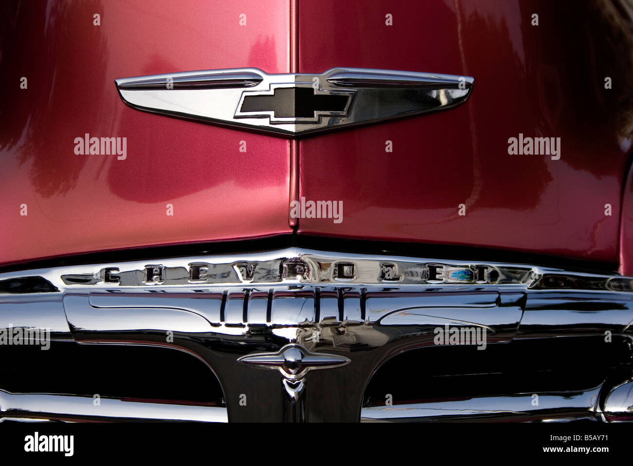 Front grille and emblem on an antique Chevrolet automobile Stock Photo ...