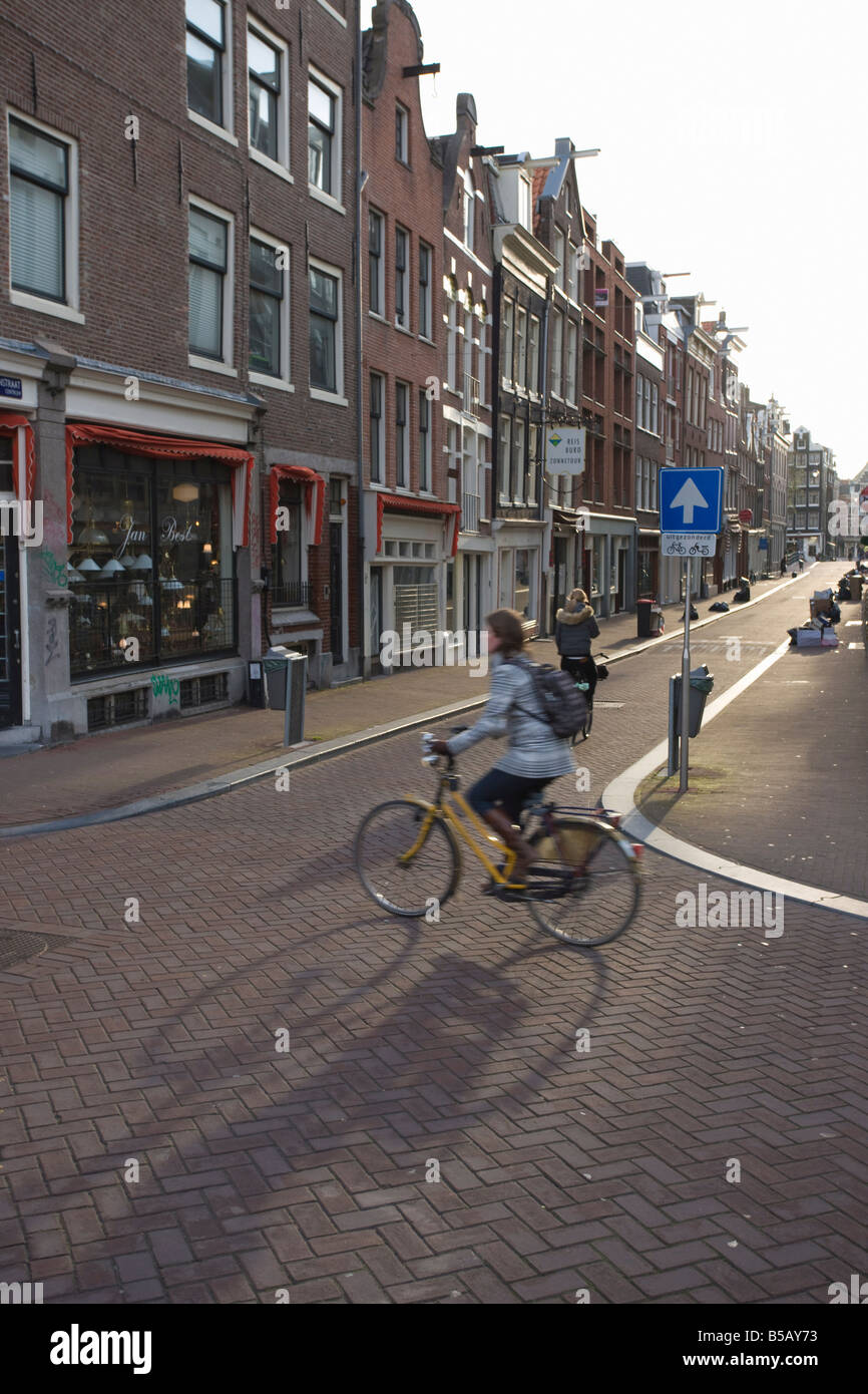 Early morning commuter on a bicycle, Amsterdam, Netherlands, Europe Stock Photo