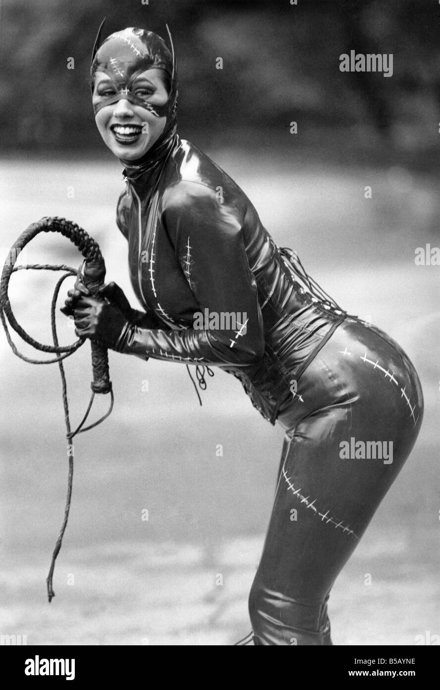 Catwoman model Tina Shaw displays her charms in the latest latex catsuit look. July 1992 P006279 Stock Photo