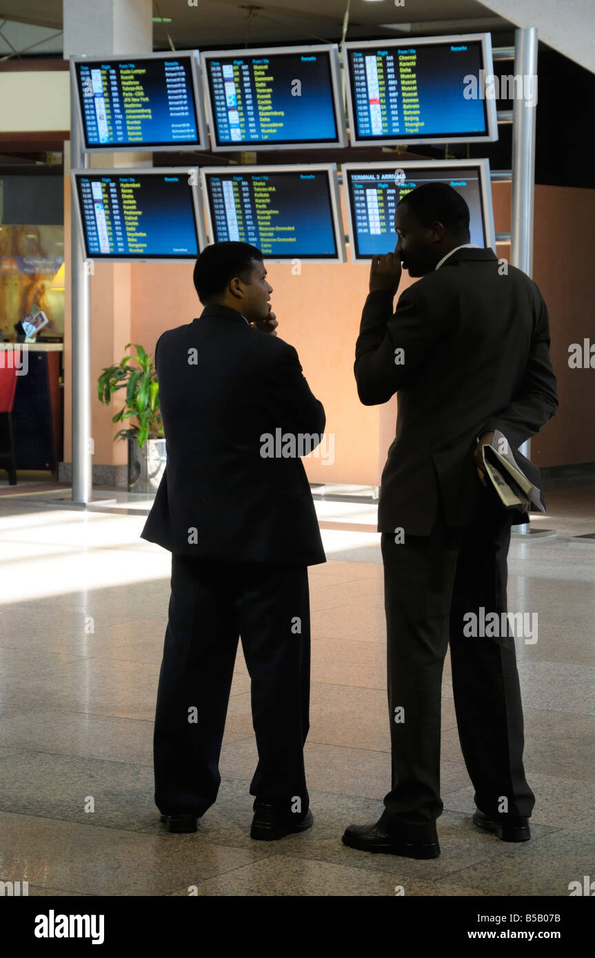Passengers awaiting flights in hi-res stock photography and images - Alamy
