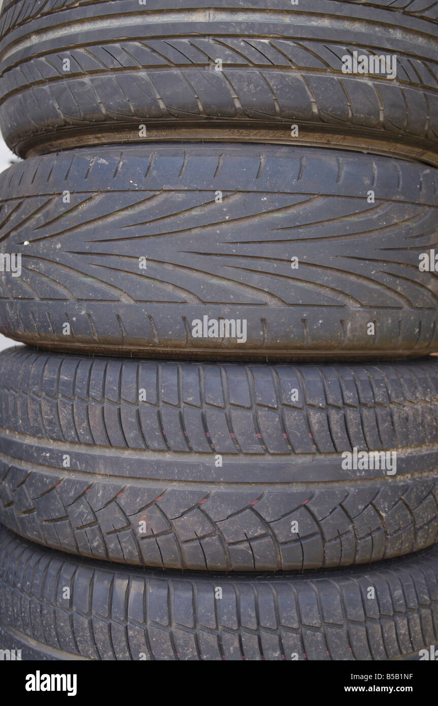 stack of used car wheels Stock Photo Alamy