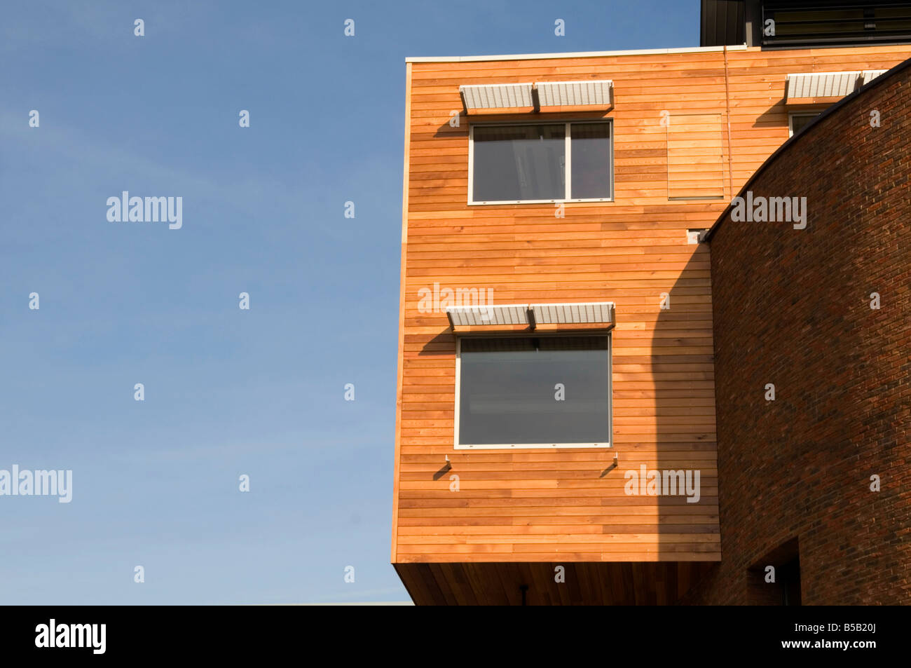 modern wooden building architecture timber building material sustainable materials wood Stock Photo
