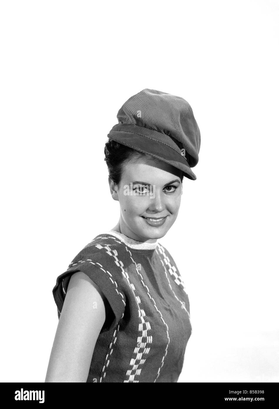 Model Jackie White wearing red coduroy hat.  Circa 1963 Stock Photo