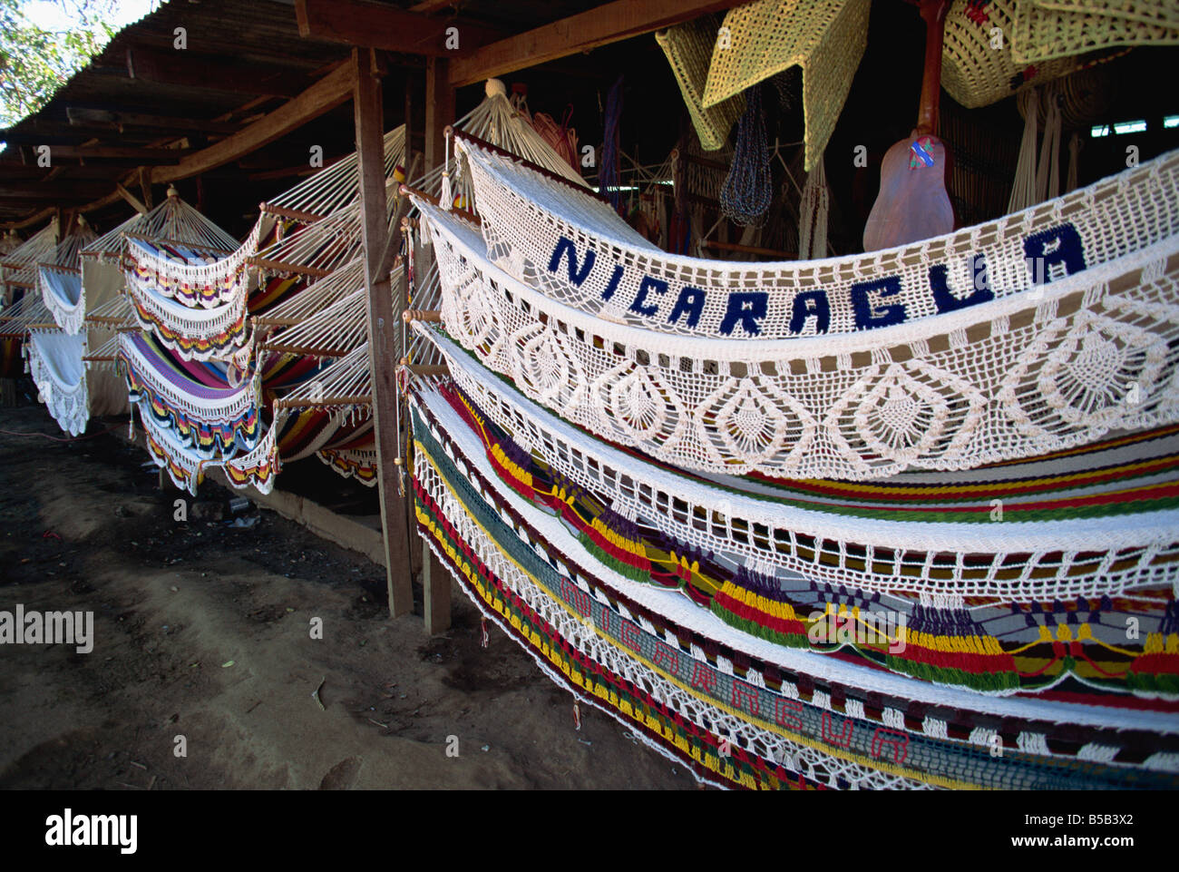 Elaborate hammocks for sale in the market, Masaya, Nicaragua, Central America Stock Photo