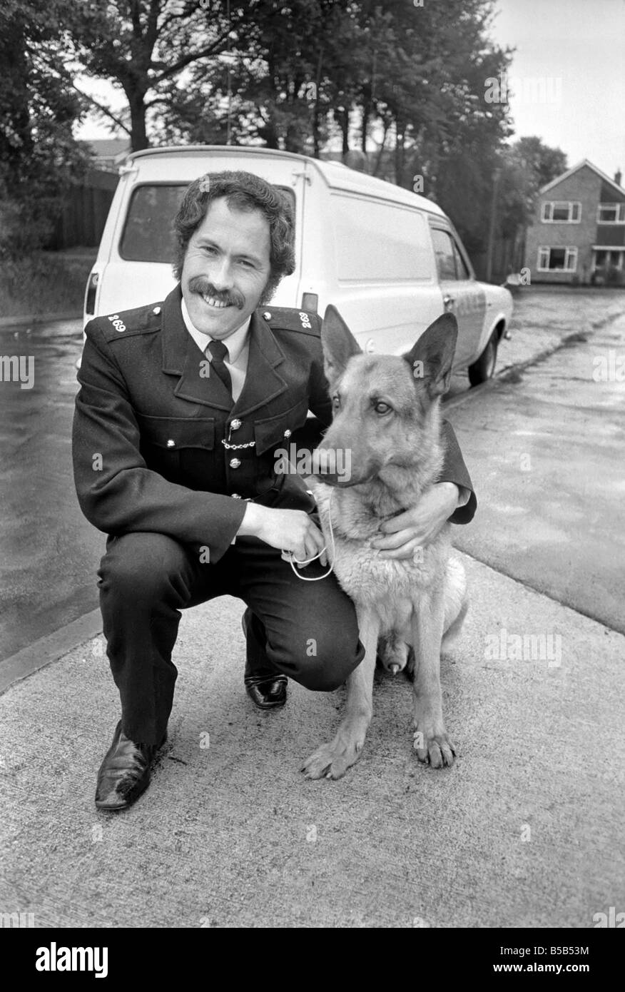 Police dog Musk commended by a judge at Reading after hearing how the dog had discovered a knife used in an attack. ;PC Fred Willsner with his dog Musk. ;May 1975 Stock Photo