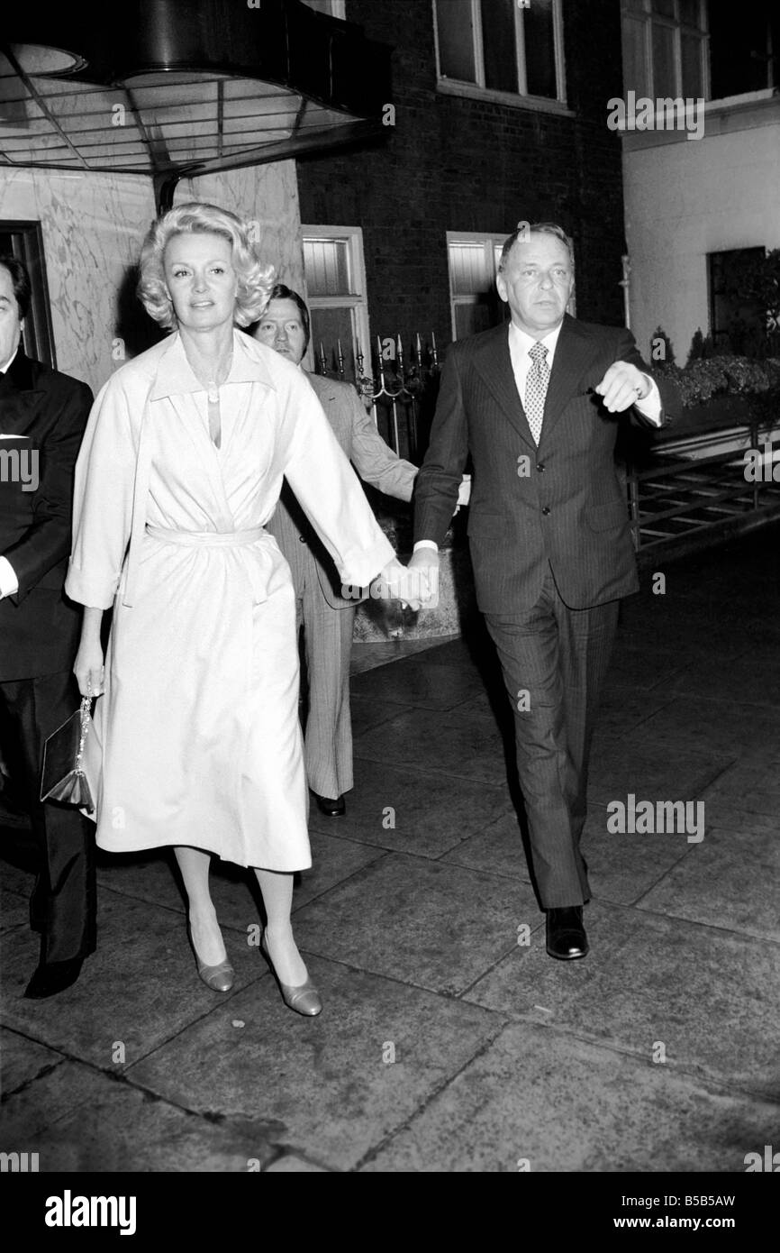 Frank Sintara and his girlfriend Barbara Marx leaving Claridges on the way to Mirabellas restaurant in Curzon St;Frank stopped outside the hotel to sign autographs for a few waiting fans. ;May 1975 Stock Photo