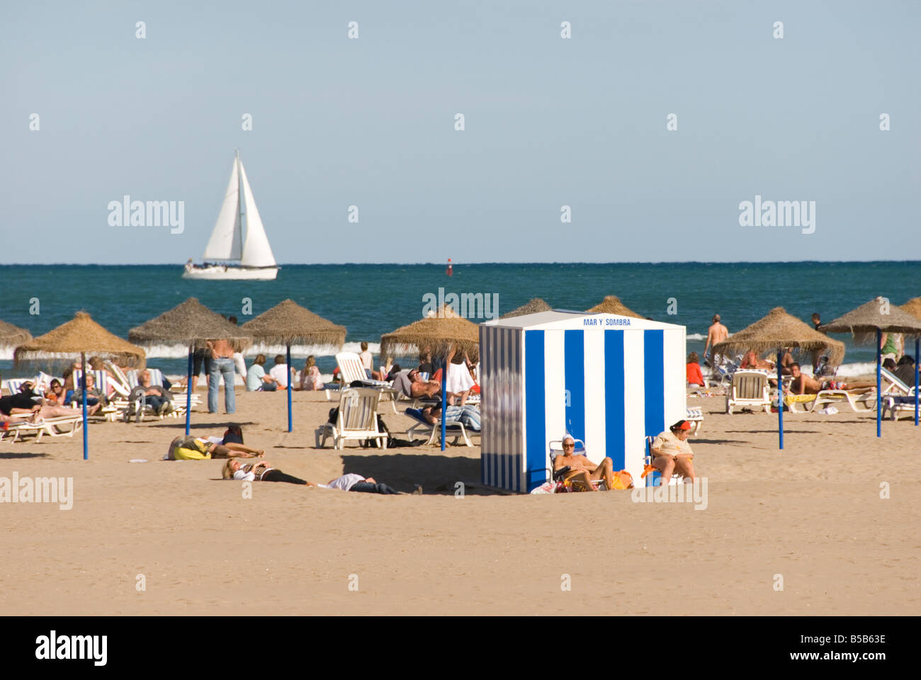 Crowded beach at Playa Malvarrosa in the city of Valencia Spain Stock Photo