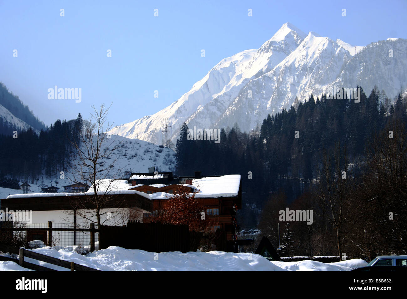 An alpine scene with a mountain peak in the background Stock Photo - Alamy