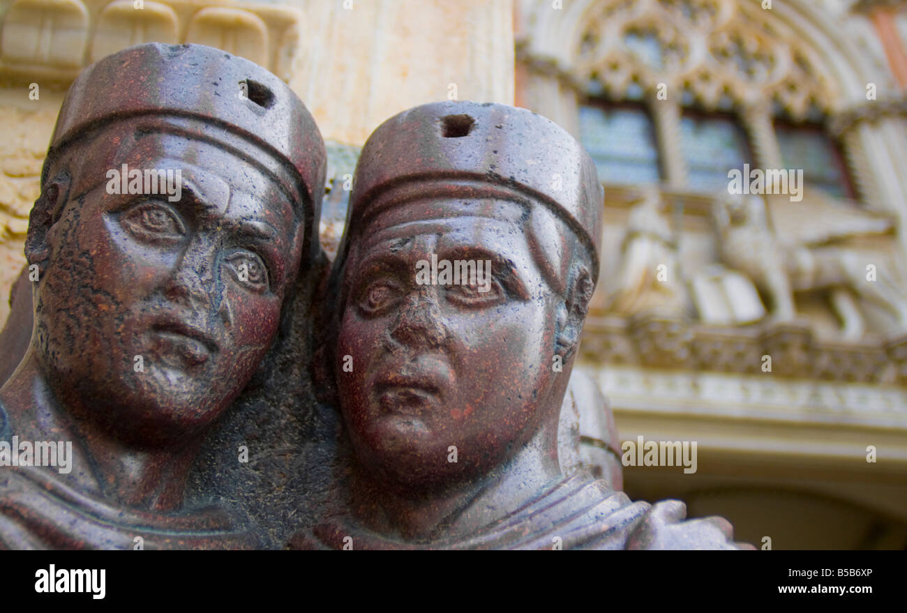 Venice, Veneto, Italy. Two of the Tetrarchs (4thC statue) by St Mark's Basilica Stock Photo