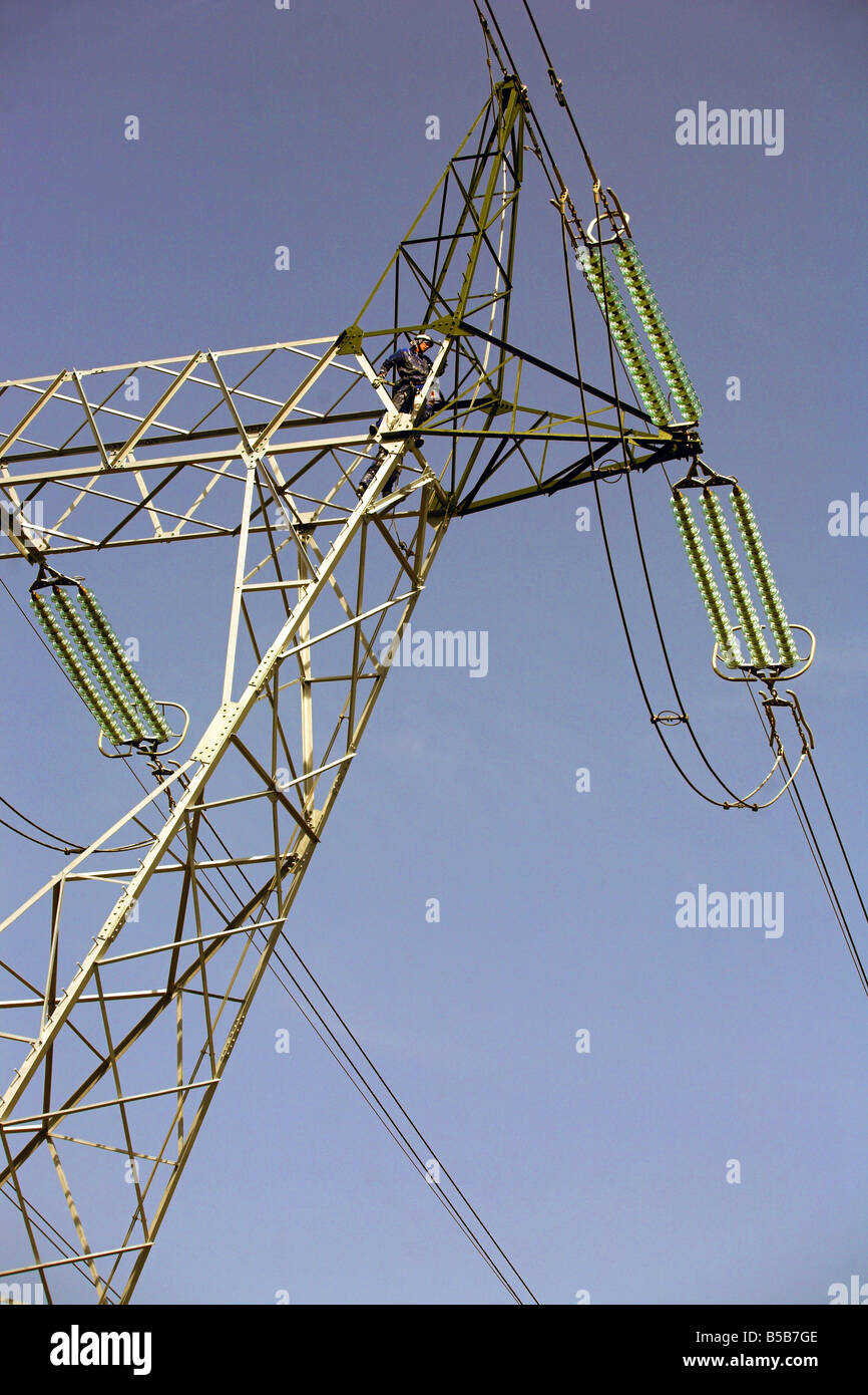 Workers maintaining the transmission line Stock Photo Alamy