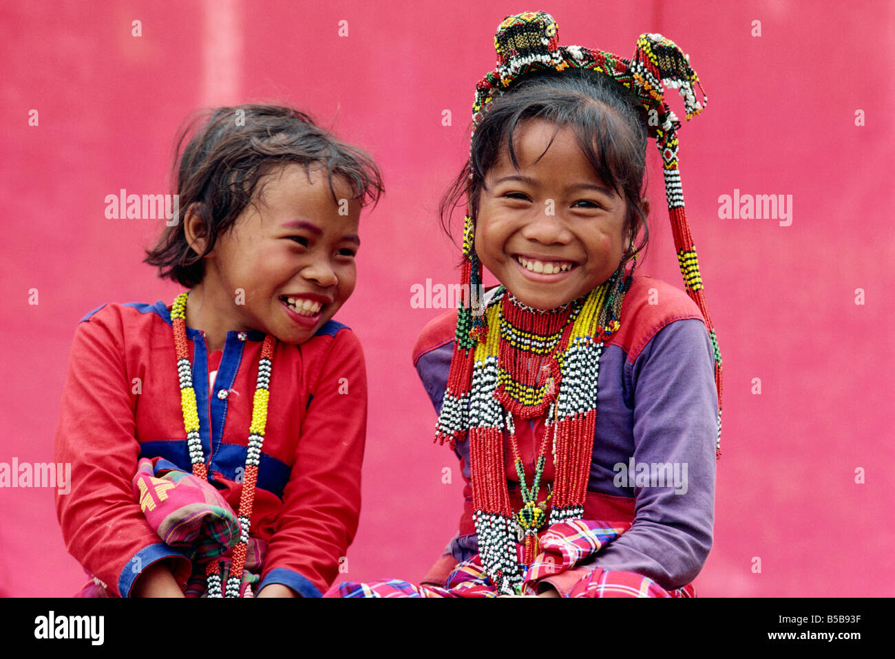 Portrait of two smiling children of the Kalagan tribe famous for Eric an ethnic dance of joy and happiness at Cotabato on Stock Photo
