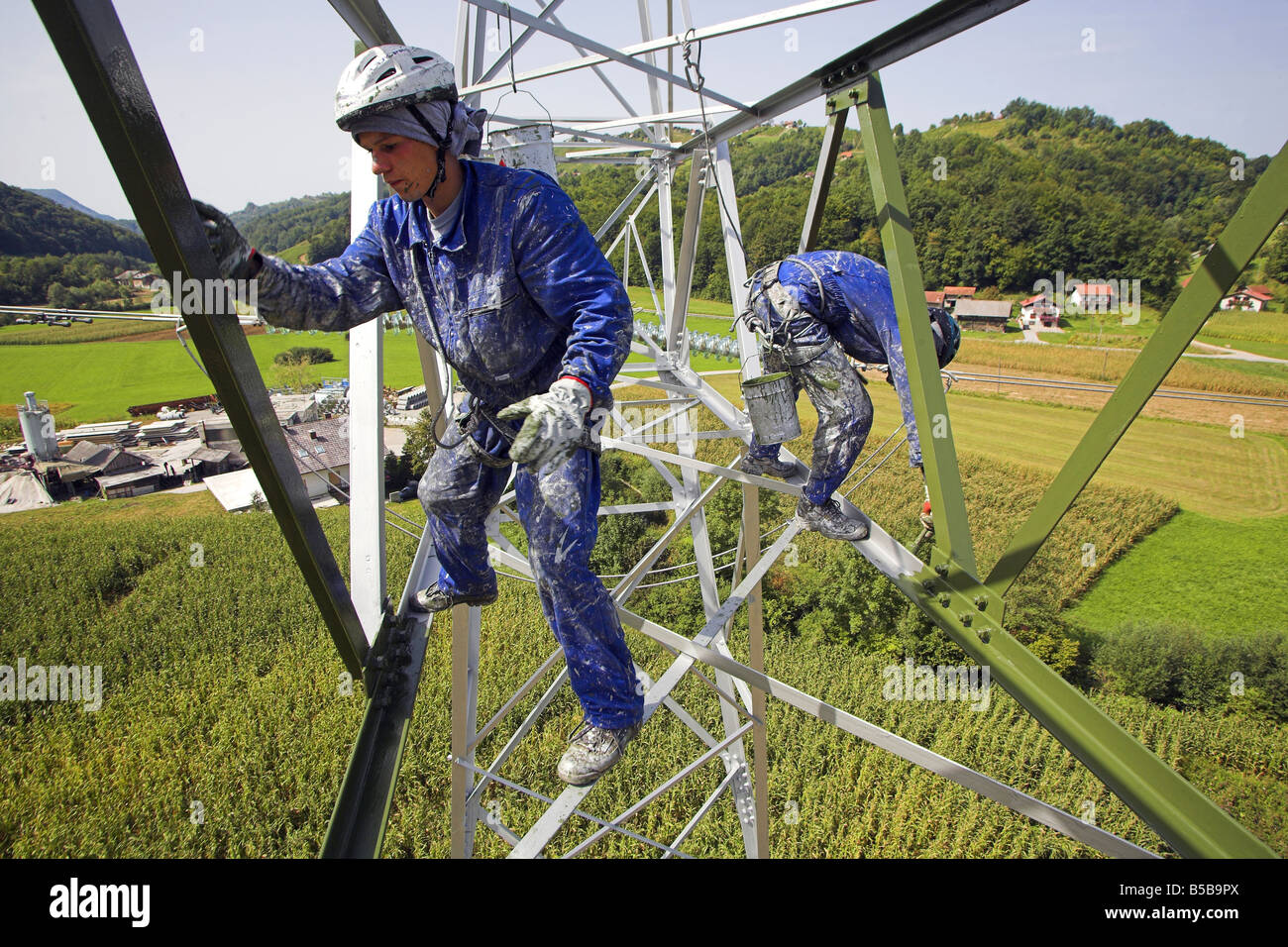 Workers maintaining the transmission line Stock Photo Alamy