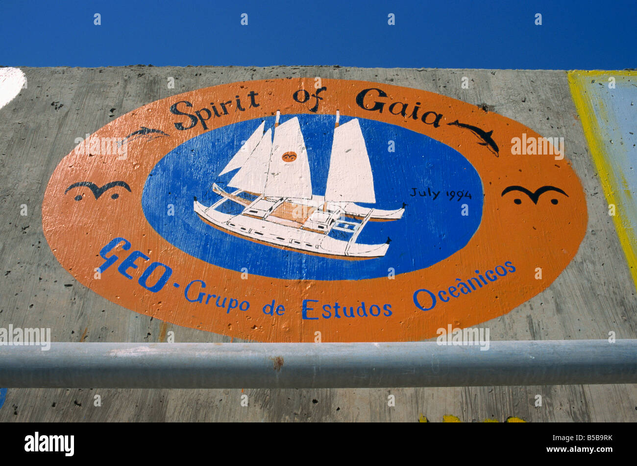 Sea wall at port decorated with pictorial souvenirs of boat s visit Porto Santo Island off Madeira Portugal Atlantic Europe Stock Photo