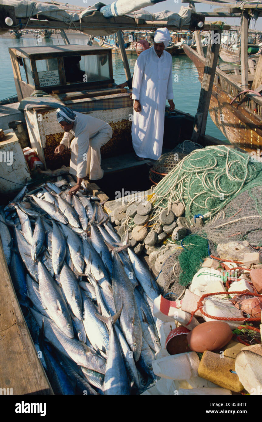 Men on fishing boat with catch Qatar Middle East P Ryan Stock Photo Alamy