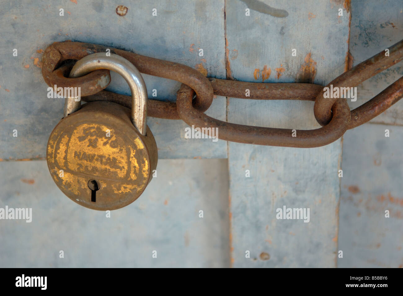 Padlock securing small shop on Bazaar Street. India, Karnataka, Hampi. Stock Photo