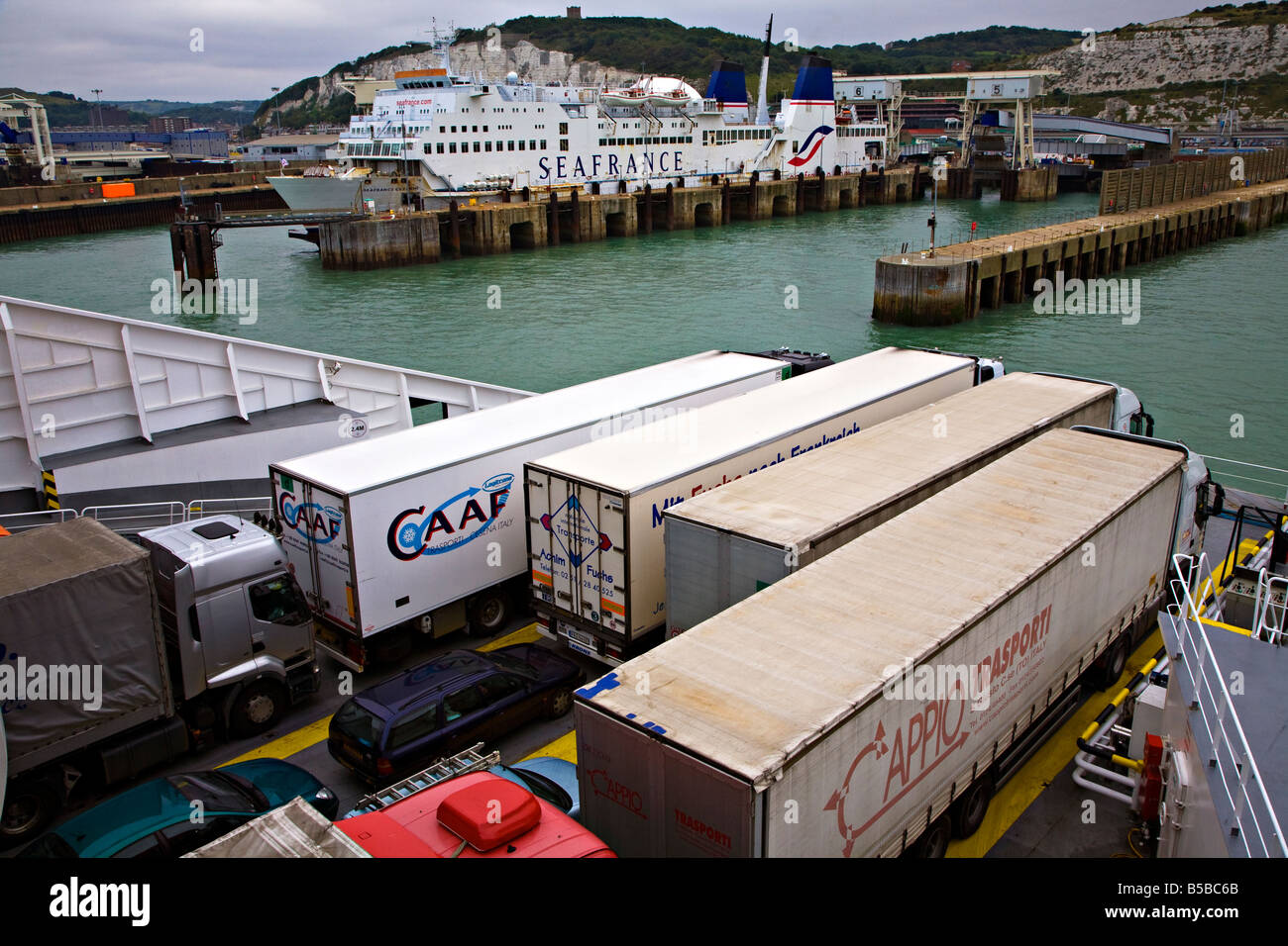 Lorries on deck of cross channel ferry approaching port of Dover England UK Stock Photo