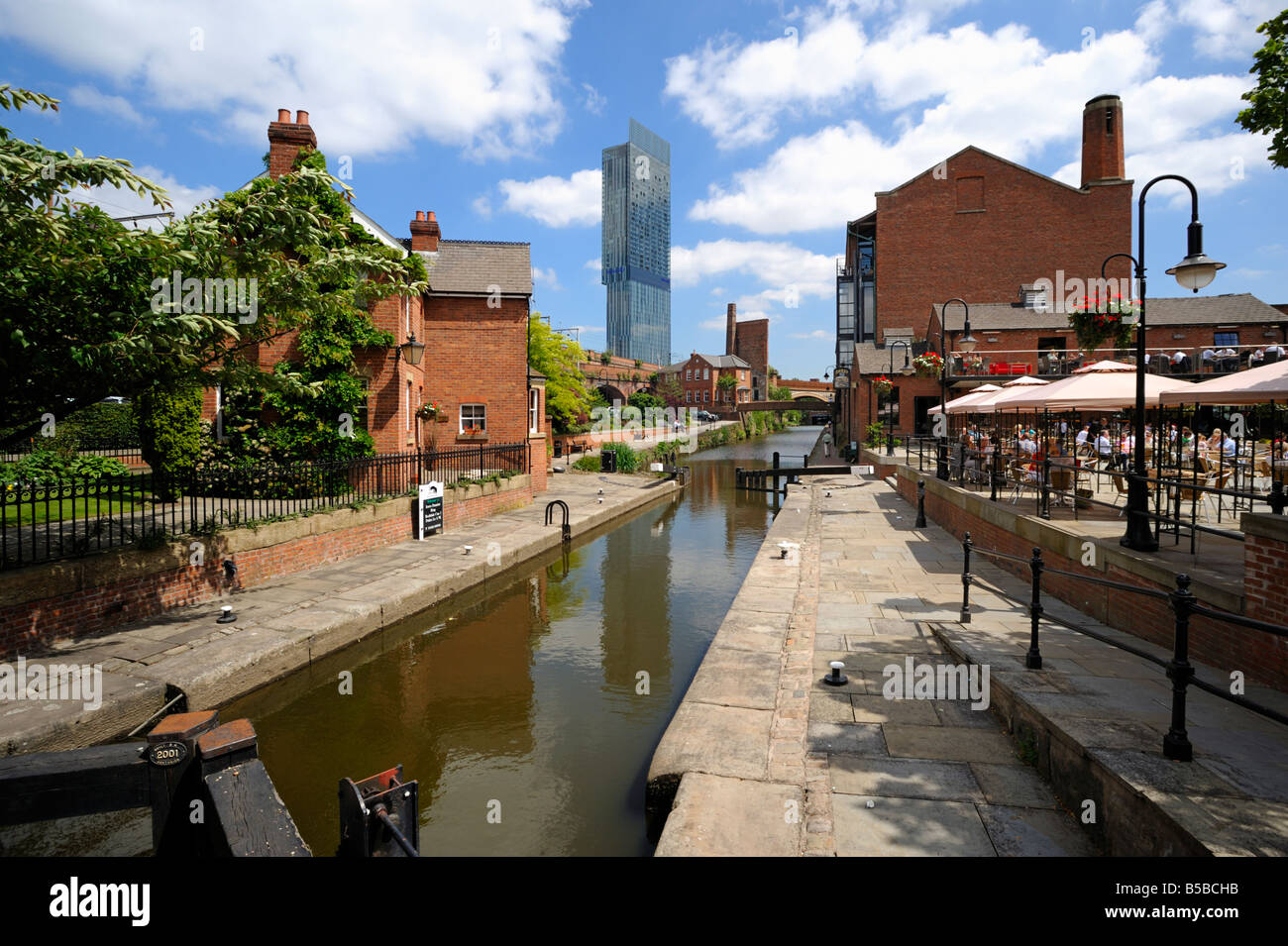 Canal and lock keepers cottage at Castlefield with the Beetham Tower in the background, Manchester, England, Europe Stock Photo