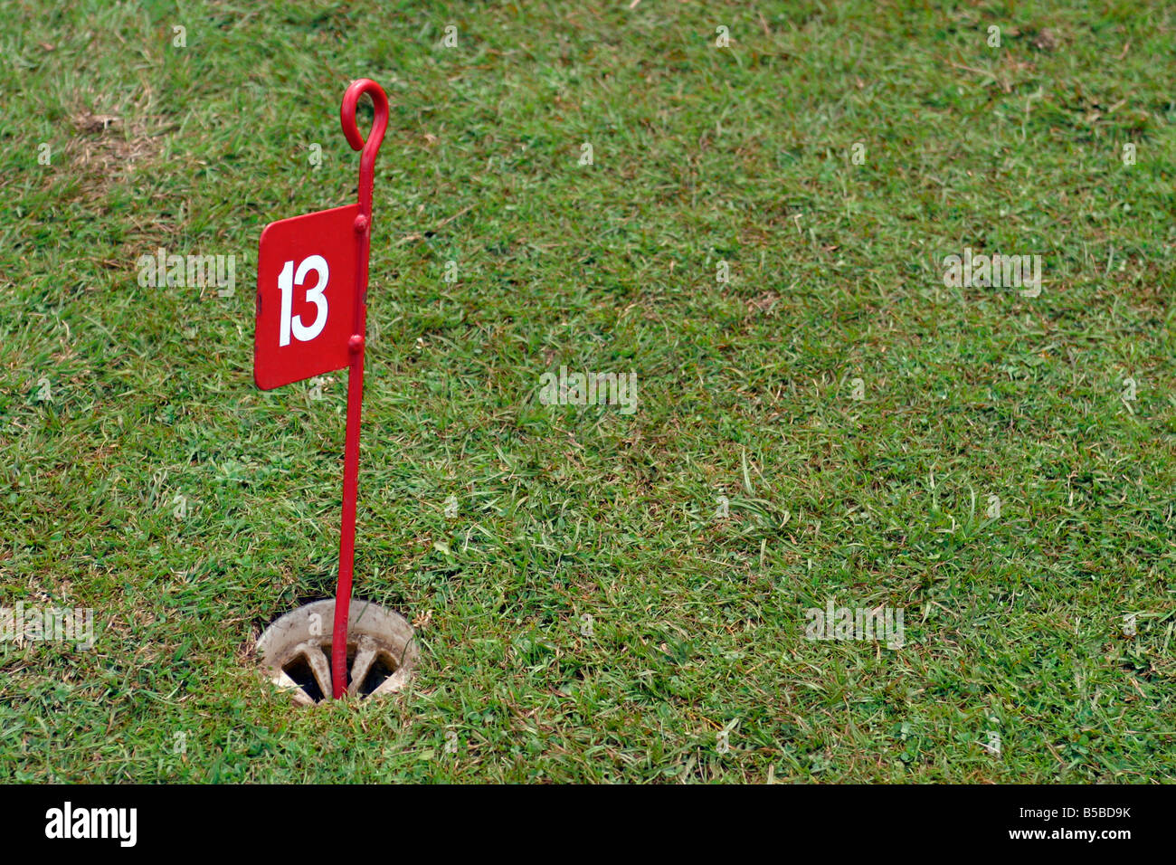 13 th golf hole flag Stock Photo Alamy