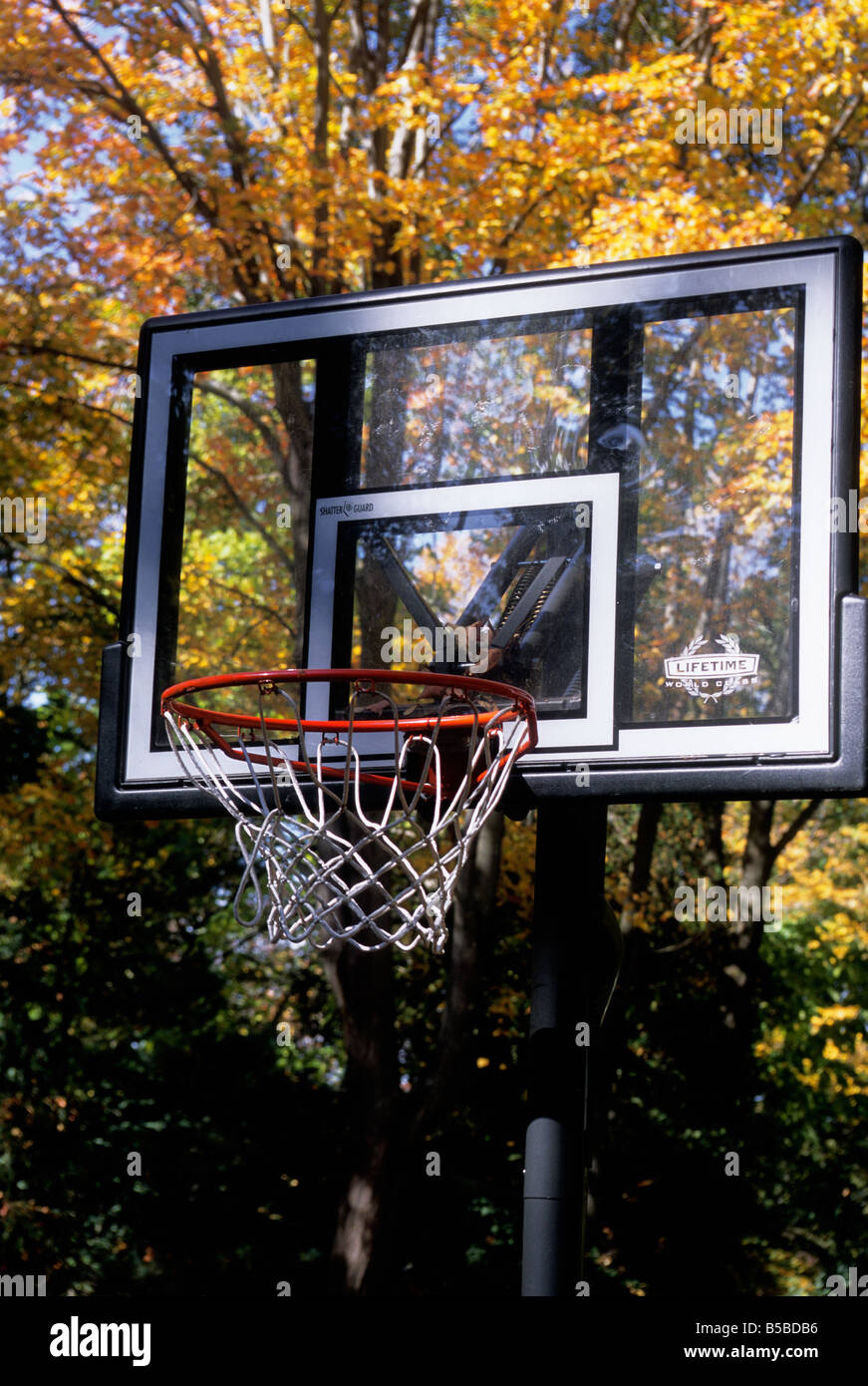 USA Connecticut Autumn Day Basketball Hoop in American Suburbs Stock Photo