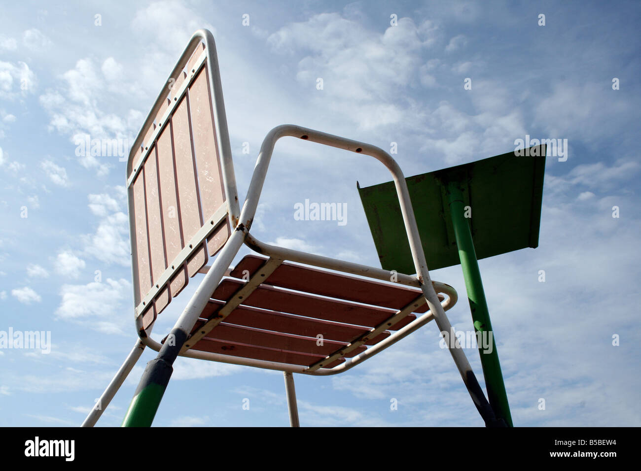 Umpire's chair on a tennis court Stock Photo