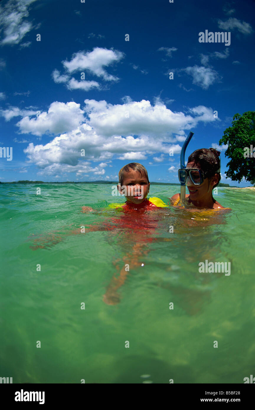 Mother and child in water, Munda, Solomon Islands, Pacific Islands, Pacific Stock Photo