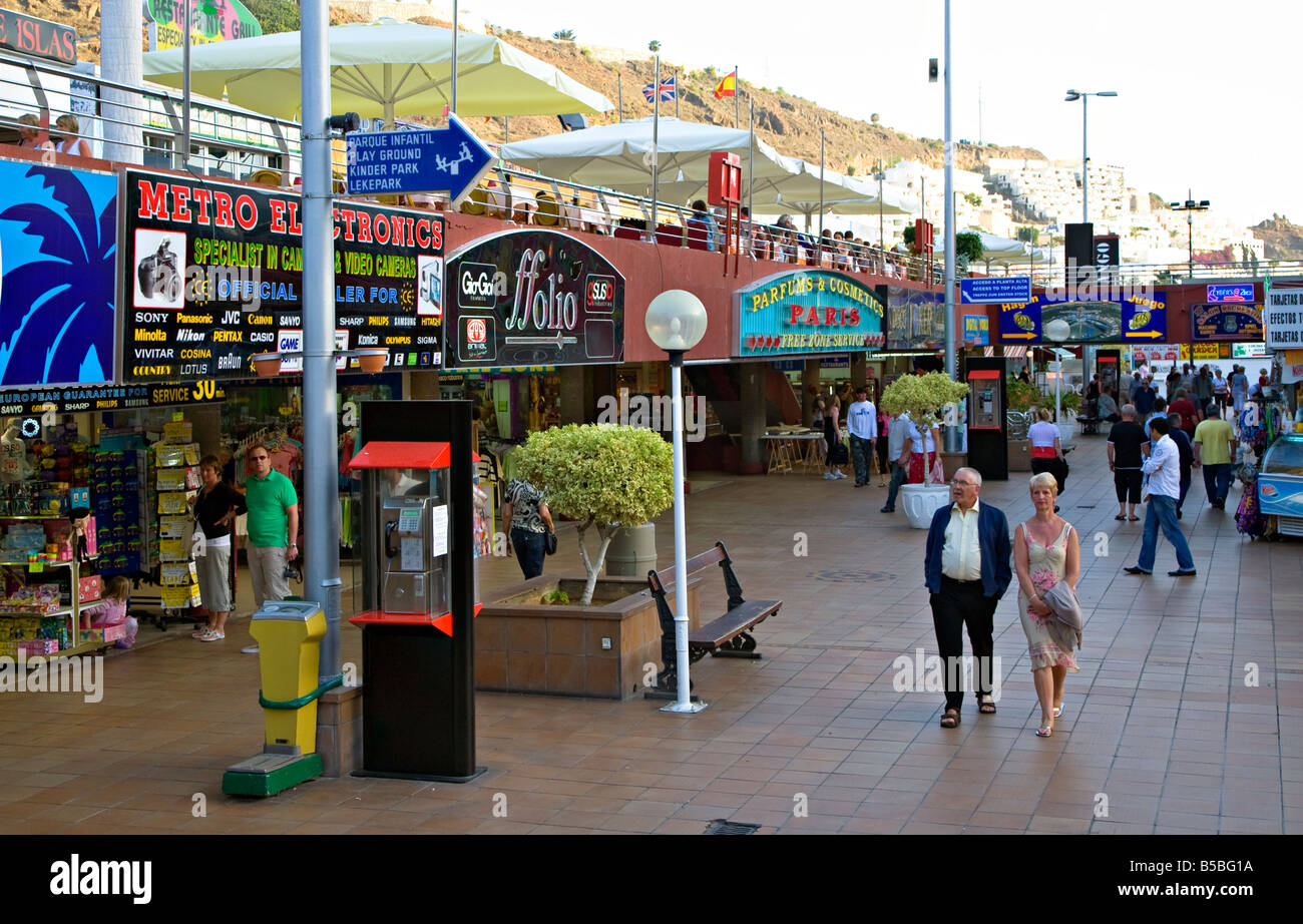 People walking through shopping centre Puerto Rico tourist resort Gran Canaria Spain Stock Photo