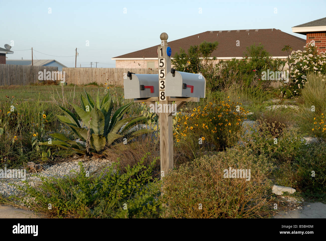 US Mailbox in front of a typical US American house Stock Photo