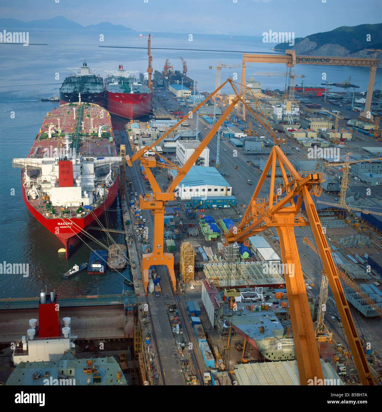 Cranes and ships in the Okpo Shipyard in South Korea Asia D Lomax Stock Photo Alamy