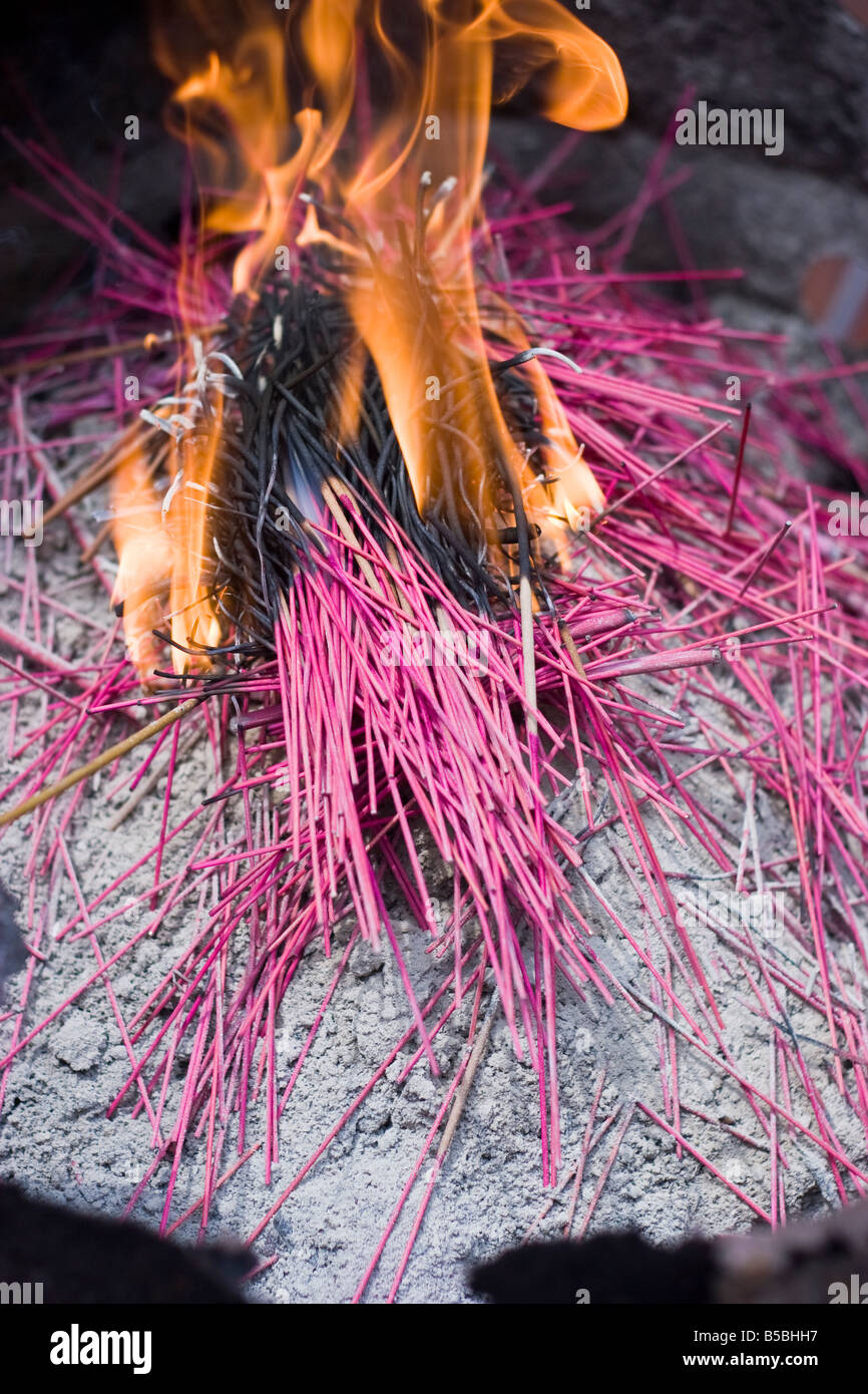 Lighted incense sticks hi-res stock photography and images - Alamy