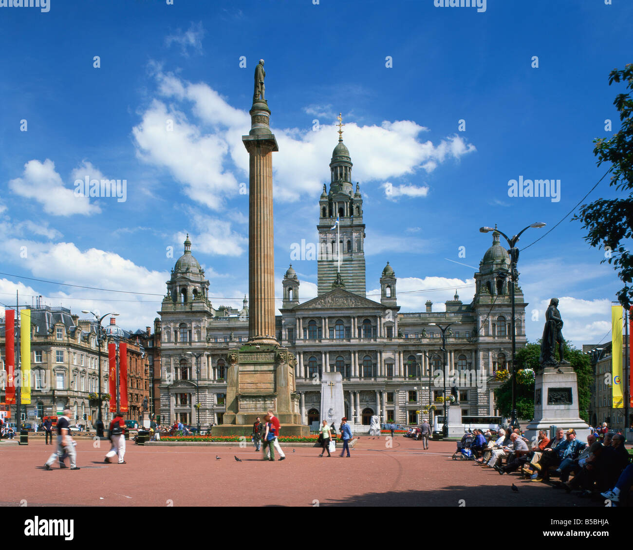 Glasgow Town Hall and monument George Square Glasgow Strathclyde Scotland United Kingdom Europe Stock Photo